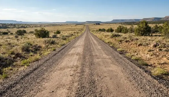 Completed graded private driveway providing rural property access in Apache County Arizona