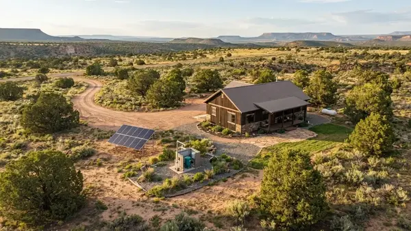 Completed remote rural homesite with private water well and off-grid infrastructure in Apache County Arizona