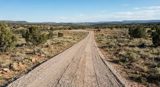 Rural driveway planned around future homesite and off-grid property improvements in Apache County Arizona