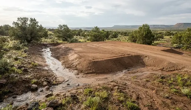 Professionally graded rural homesite with controlled drainage and runoff slopes in Apache County Arizona