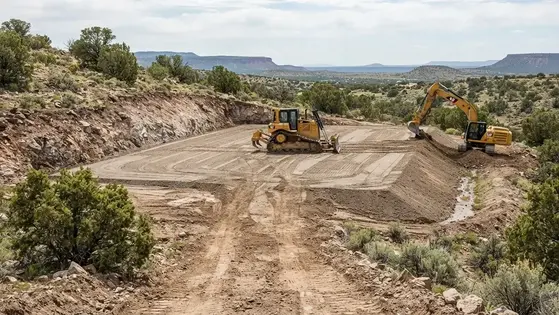 Cut and fill grading establishing a finished house pad elevation on rural Apache County Arizona acreage