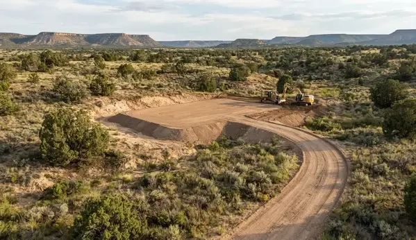 Apache County Arizona rural property with localized grading around a homesite while natural terrain and vegetation remain undisturbed
